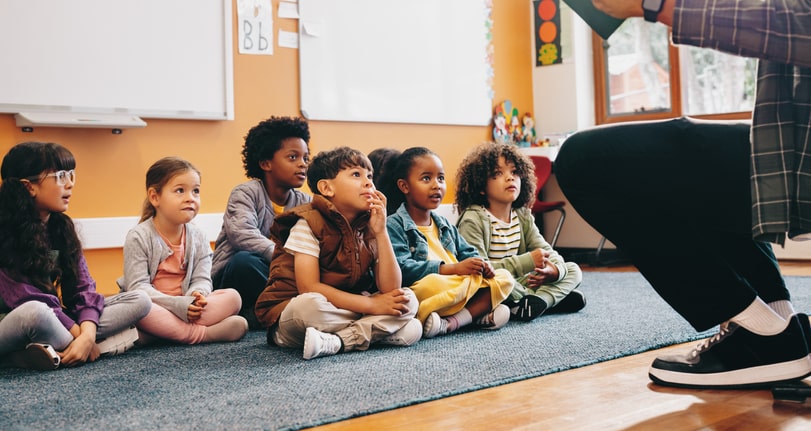 Elementary school class listens attentively to teacher.5 Golden Rules for the Classroom 