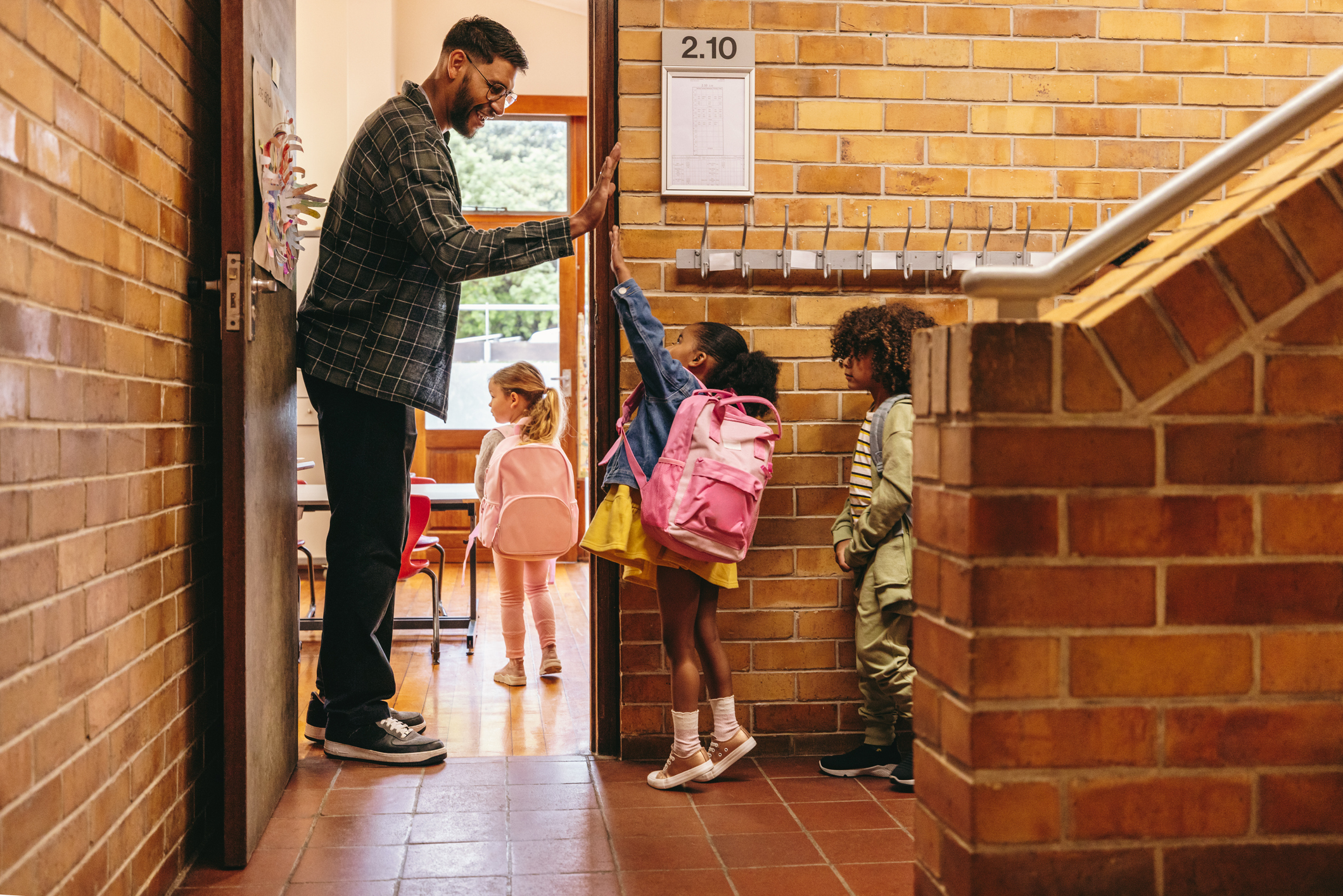 Teacher greeting and getting to know students