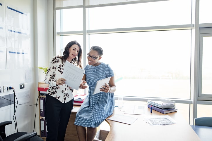 Two teachers collaborating in the classroom.