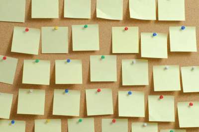 Post-its on a cork board